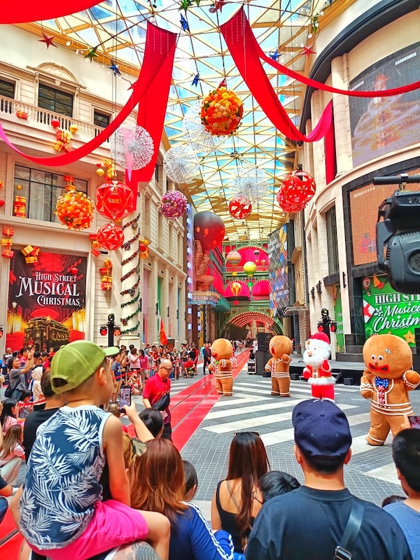 The Gingerbread And Santa Mascot Dance Performance At High Street