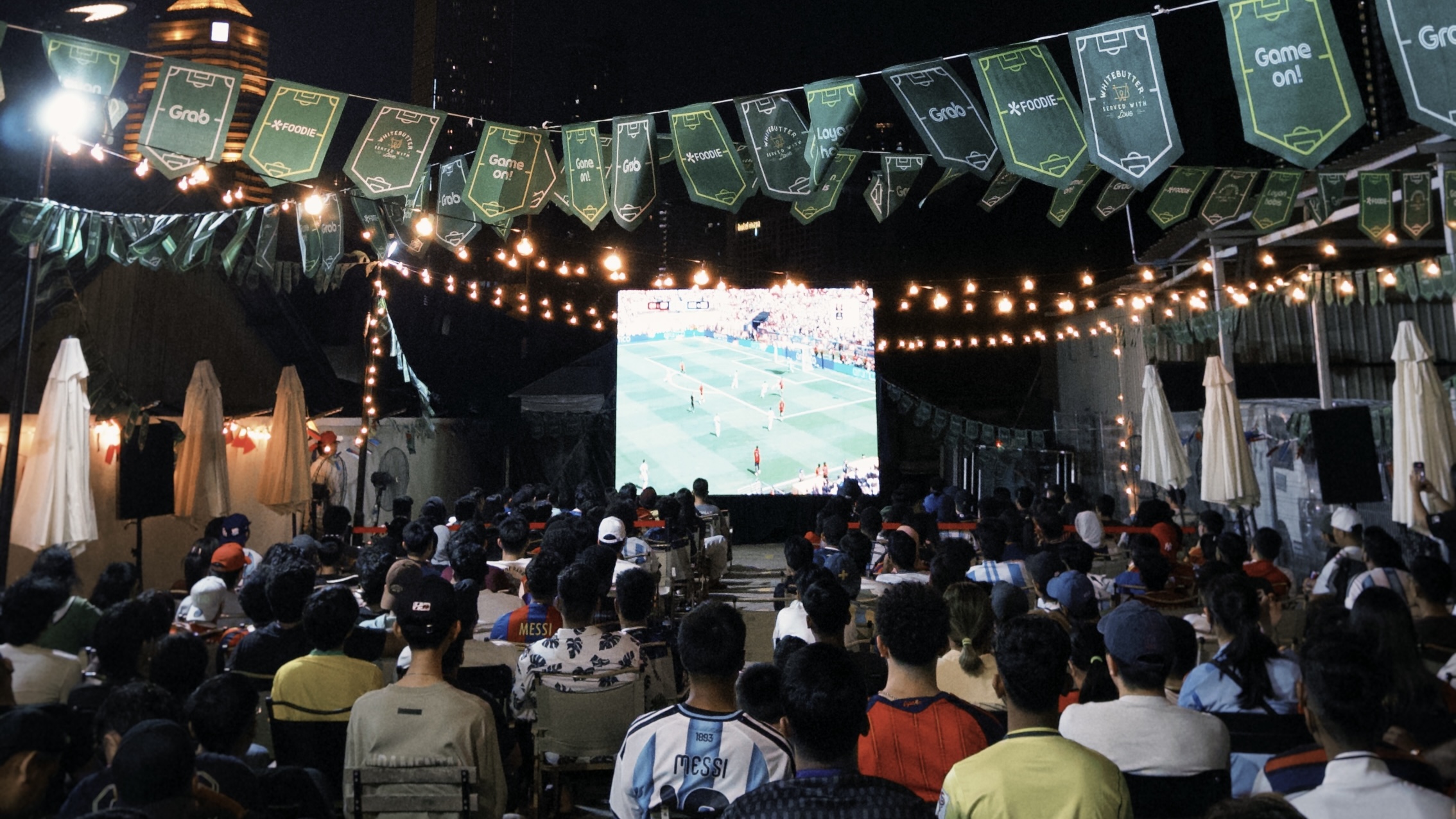 Football Fans Immersed In The Excitement Of The FIFA World Cup Final